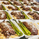 A hearty pulled beef ragu topped with parmesan and served on a bed of penne with freshly prepared asparagus.
